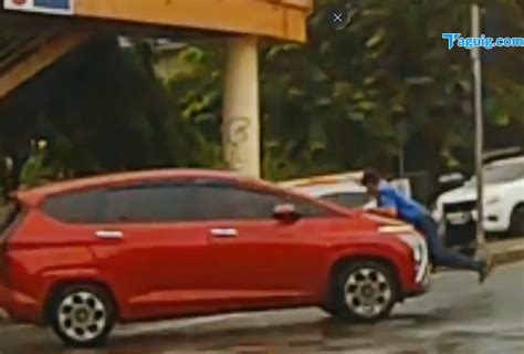 LTO suspends license of driver who dragged MMDA enforcer in .